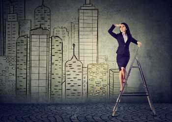 Business woman on a ladder looking far away forecasting real estate market